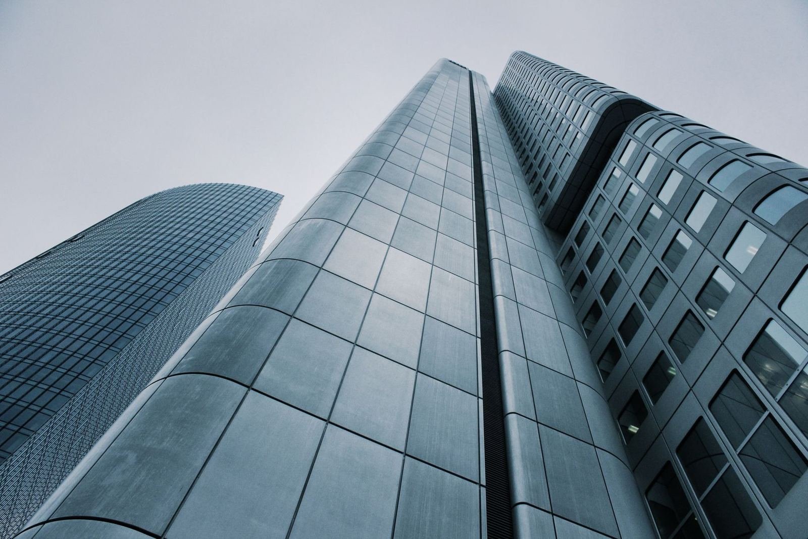 Glass towers seen from below.